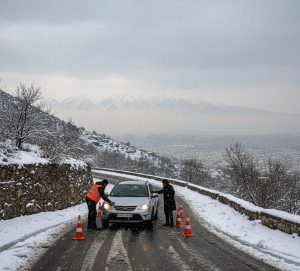 امداد کرمان موتور در ولنجک در روز برفی